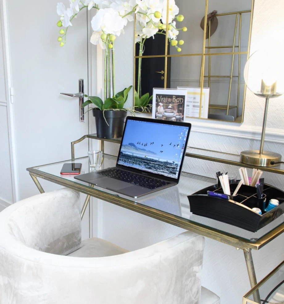 Work desk in a room at Hôtel des Roys in Versailles – elegant workspace with laptop, glass desk and business setup